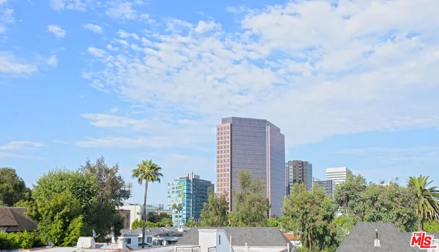 a view of a city with tall buildings in the background