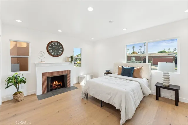 a bedroom with a bed and a cabinets