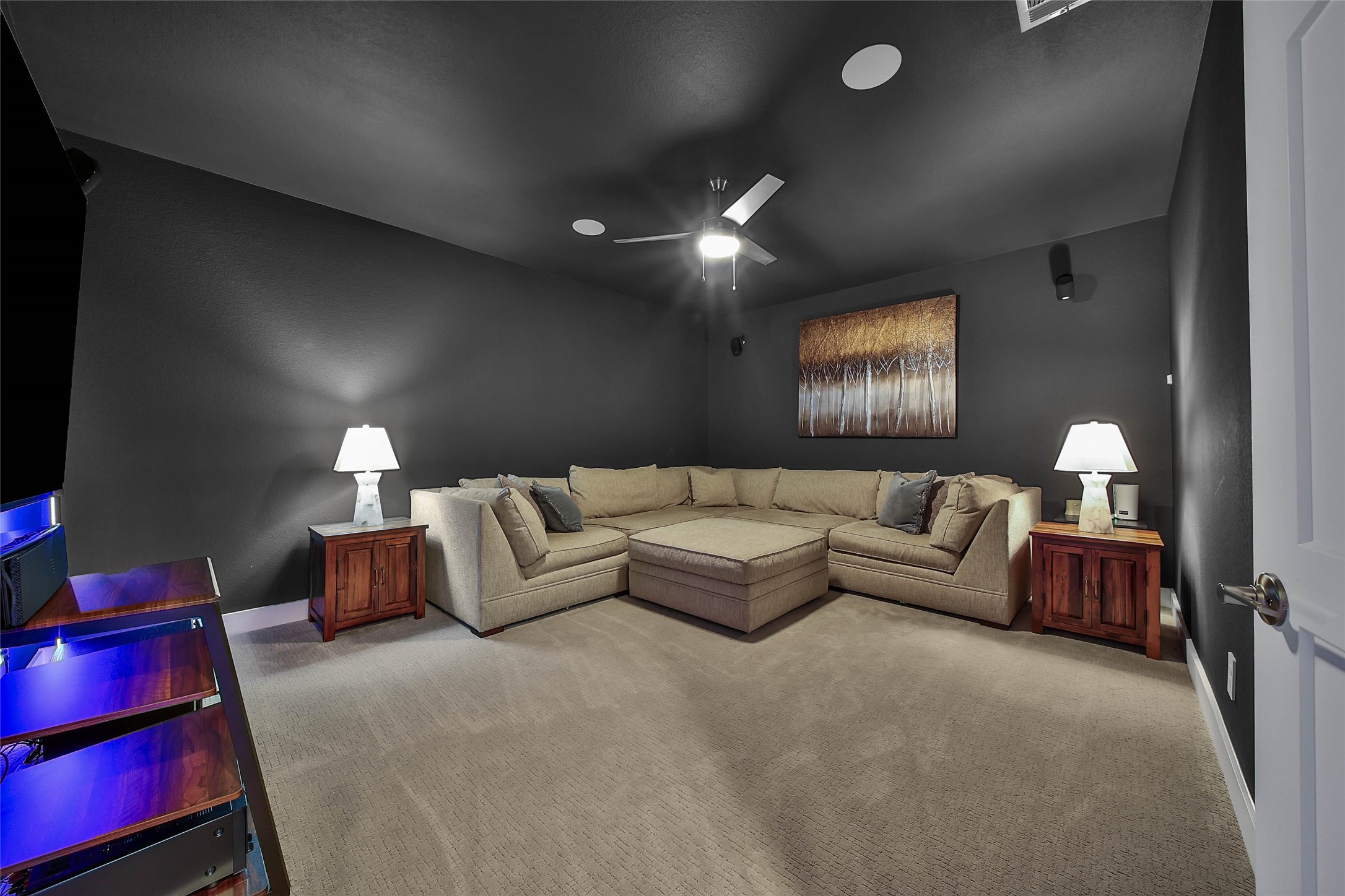 1015 Oak Briar Lane Conroe, TX 77384 - Photo 40 of 50 a living room with furniture and a lamp