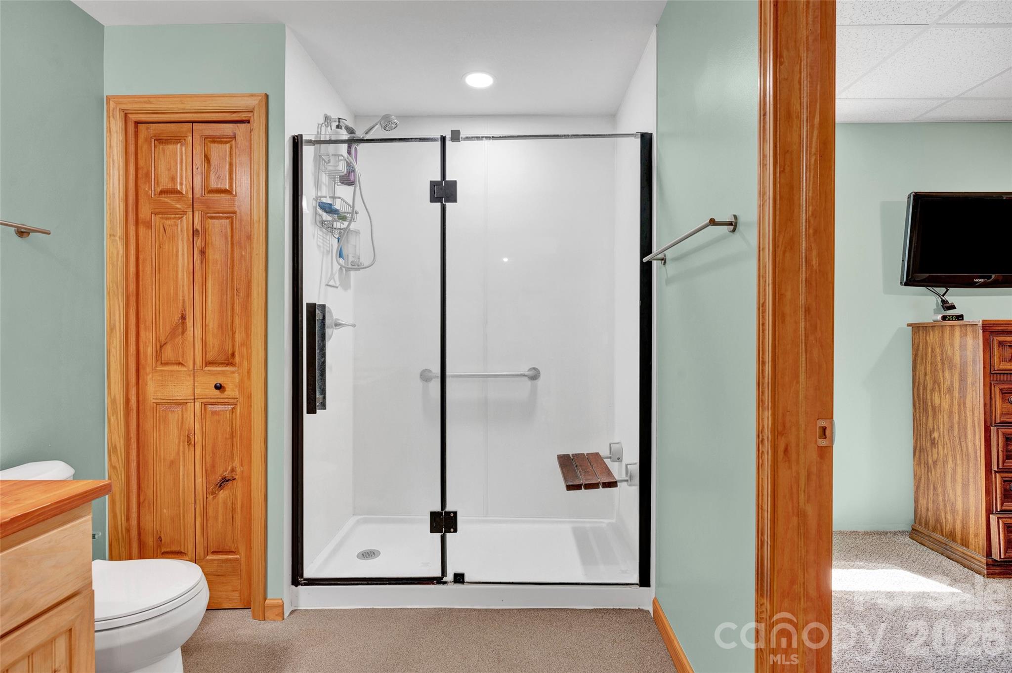 359 Rash Road Olin, NC 28660 - Photo 34 of 46 a bathroom with a shower and a toilet
