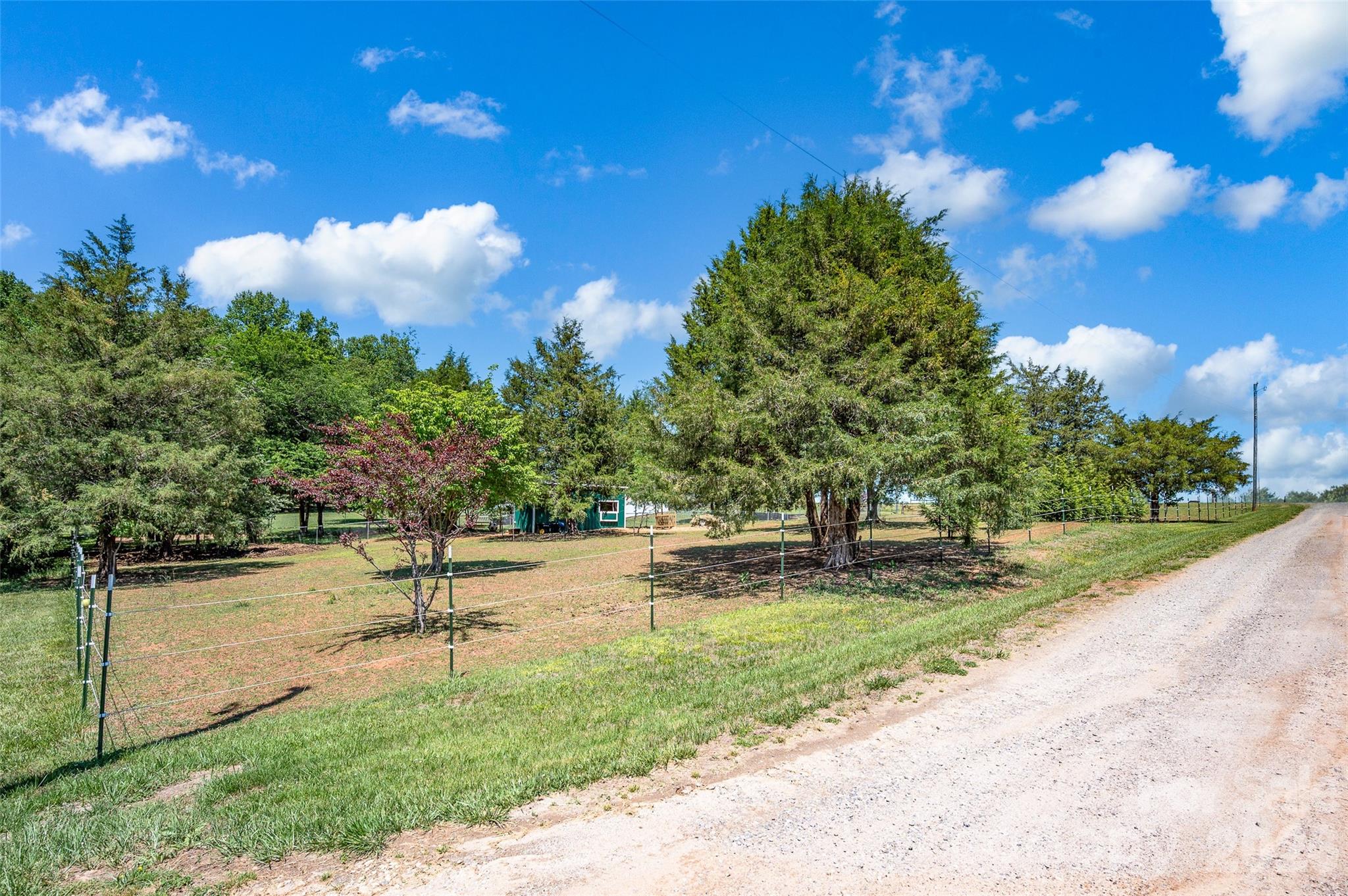 359 Rash Road Olin, NC 28660 - Photo 45 of 46 a view of a park with swings and slides