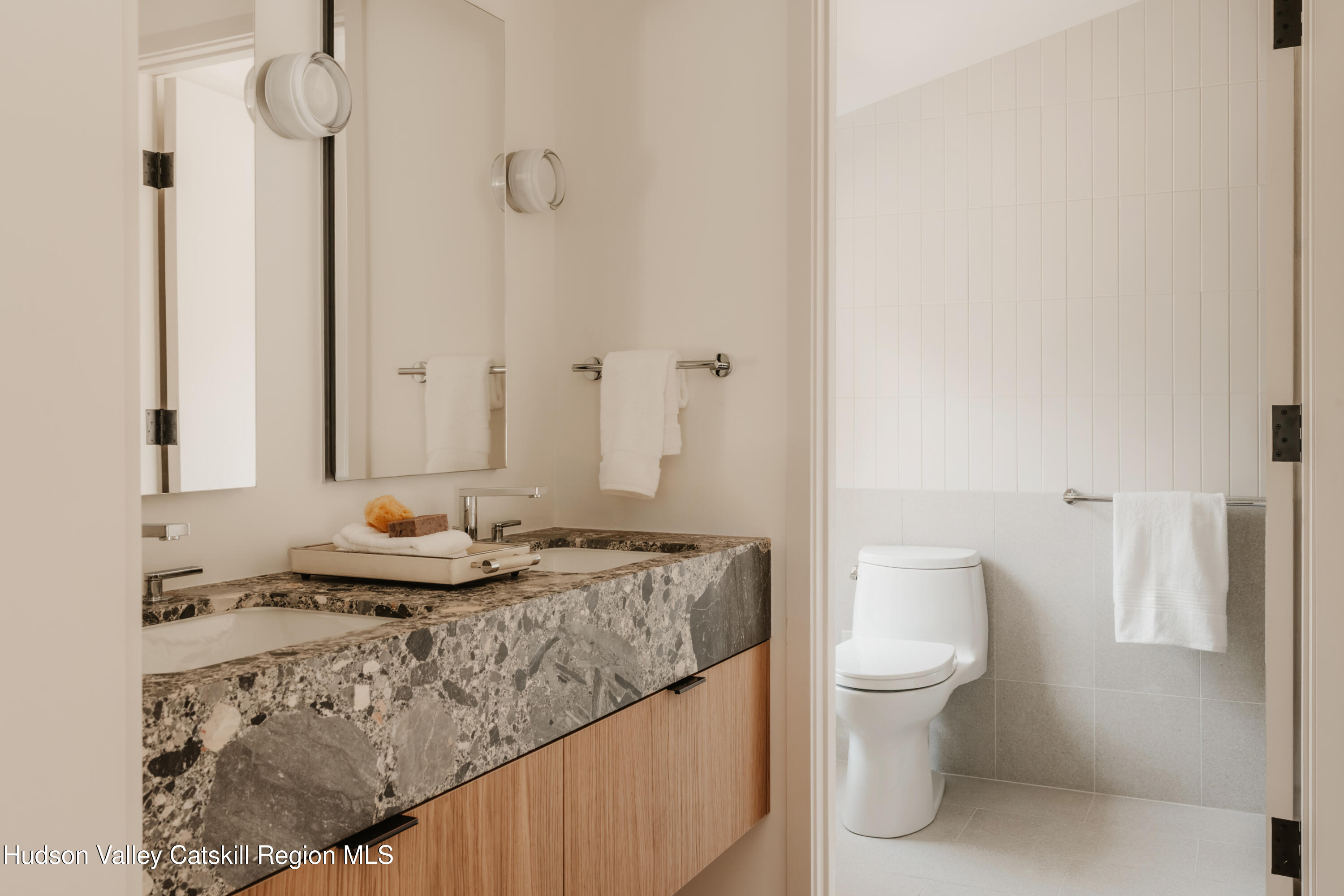 332 Mohonk Road High Falls, NY 12440 - Photo 27 of 38 a bathroom with a granite countertop sink a toilet and a mirror