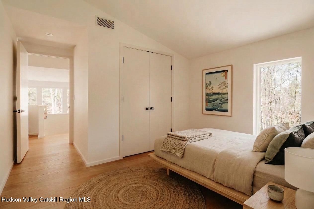 332 Mohonk Road High Falls, NY 12440 - Photo 29 of 38 a bedroom with a bed and a window