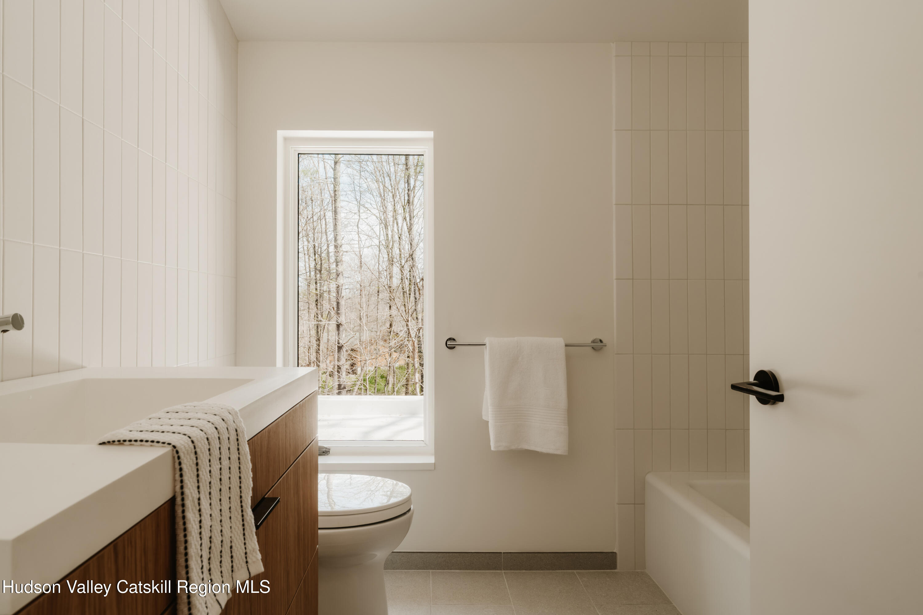 332 Mohonk Road High Falls, NY 12440 - Photo 30 of 38 a bathroom with a sink a toilet and tub