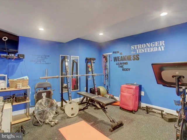 a room with a bed and a chair