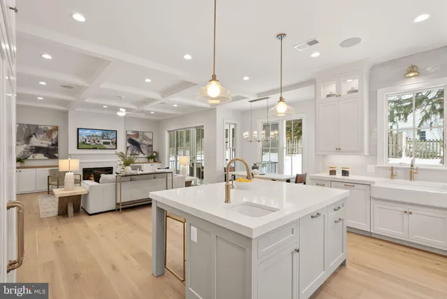 a spacious bedroom with a large bed and a large window