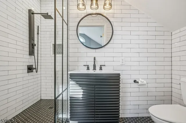 a bathroom with a toilet and a sink