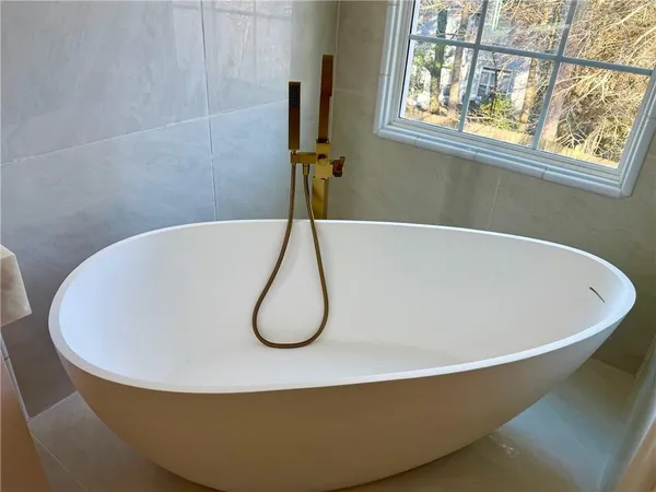 a view of a bathtub in a bathroom