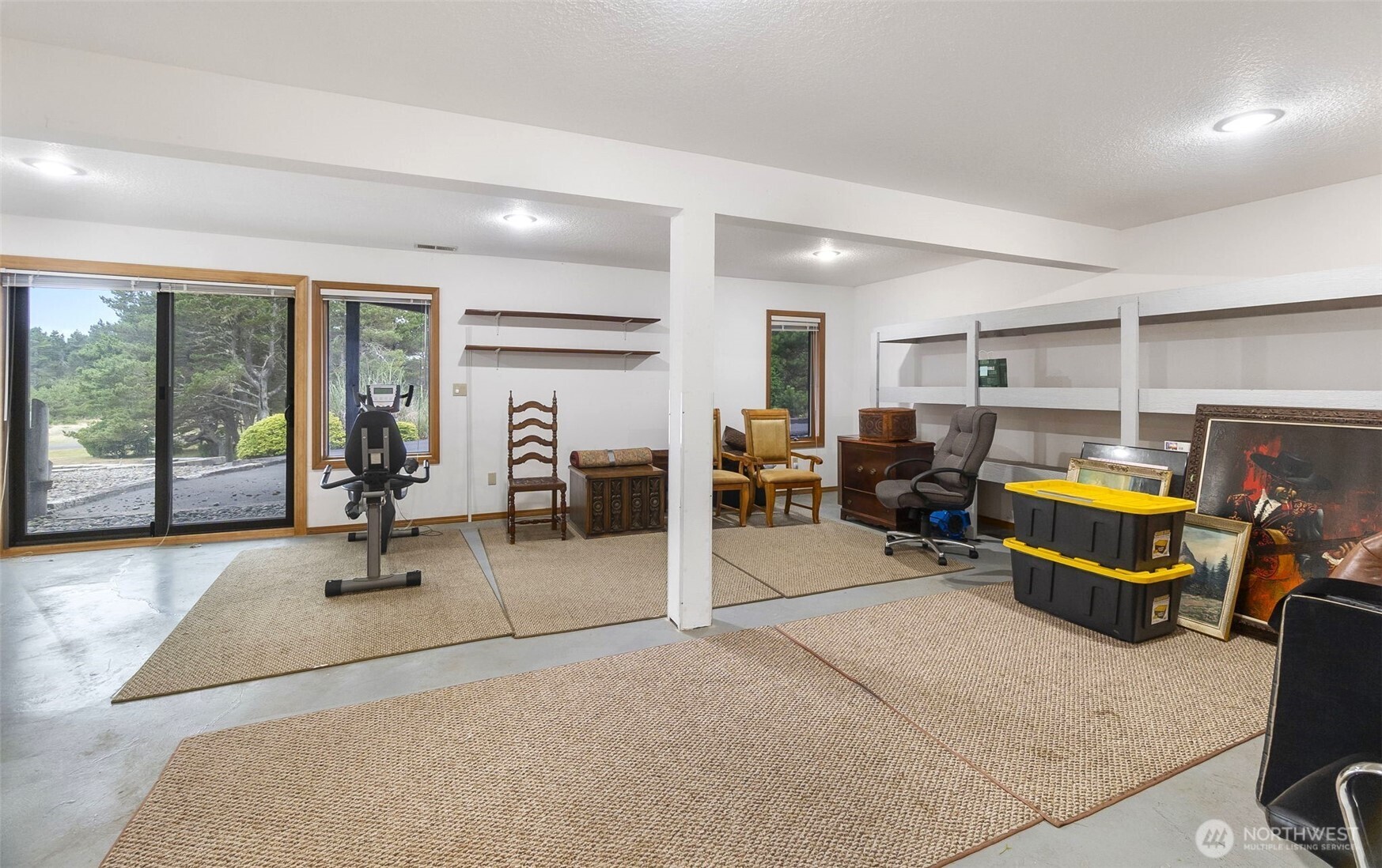 280 Surf Street Westport, WA 98595 - Photo 32 of 35 a room with gym equipment and large window