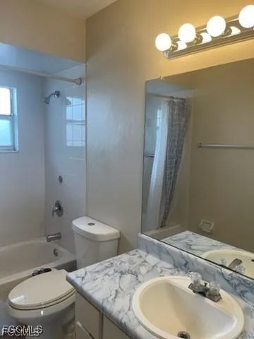 a view of a glass door with a yard from a window