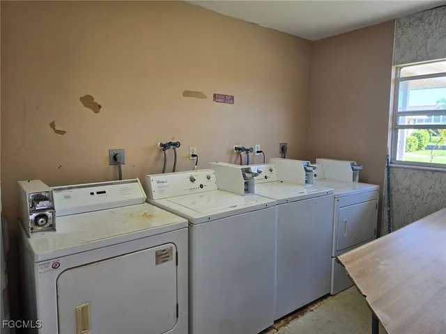 a view of swimming pool with a yard