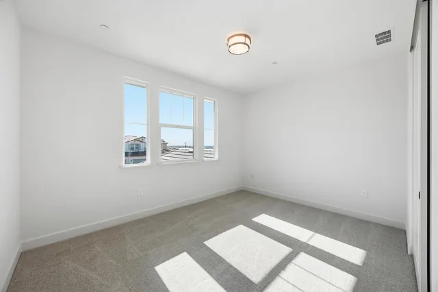 an empty room with windows