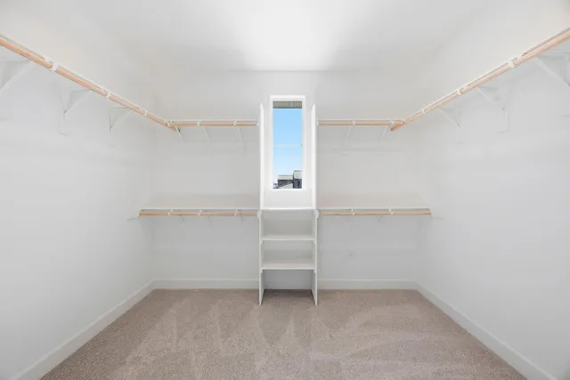 a view of an empty walk in closet
