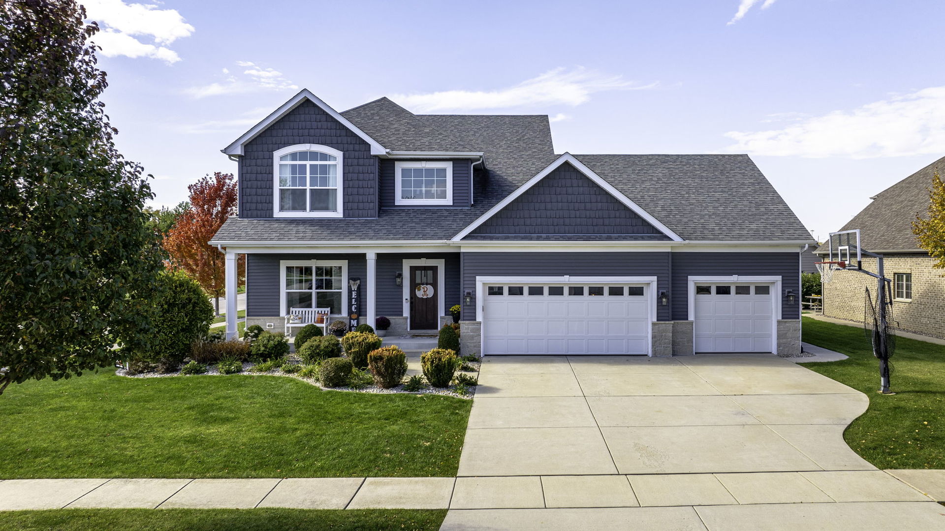 301 Arrowhead Drive Minooka, IL 60447 - Photo 2 of 43 a front view of a house with garden