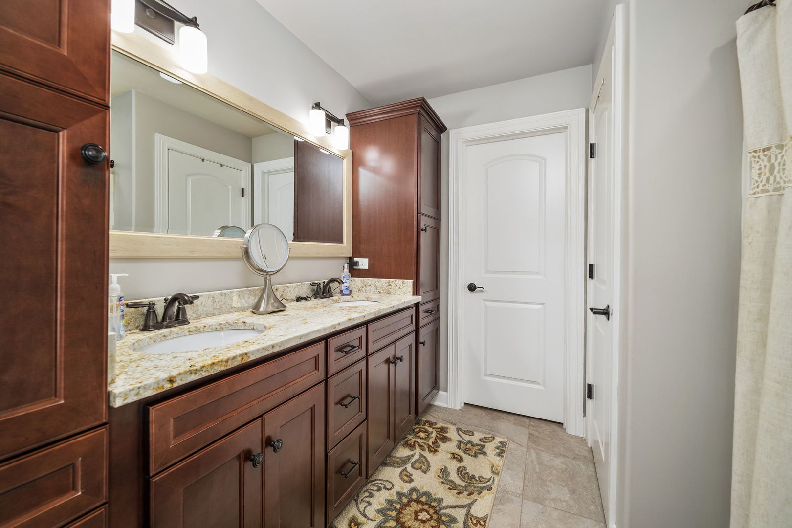 301 Arrowhead Drive Minooka, IL 60447 - Photo 22 of 43 a spacious bathroom with a double vanity sink and a mirror