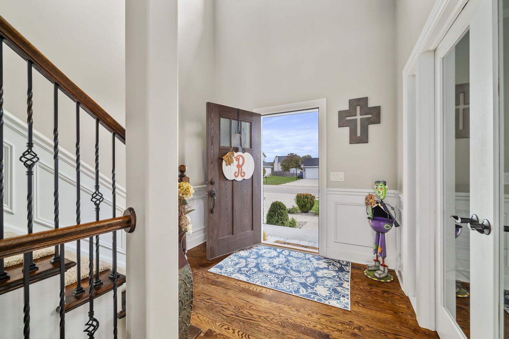 301 Arrowhead Drive Minooka, IL 60447 - Photo 7 of 43 a view of an entryway with wooden floor