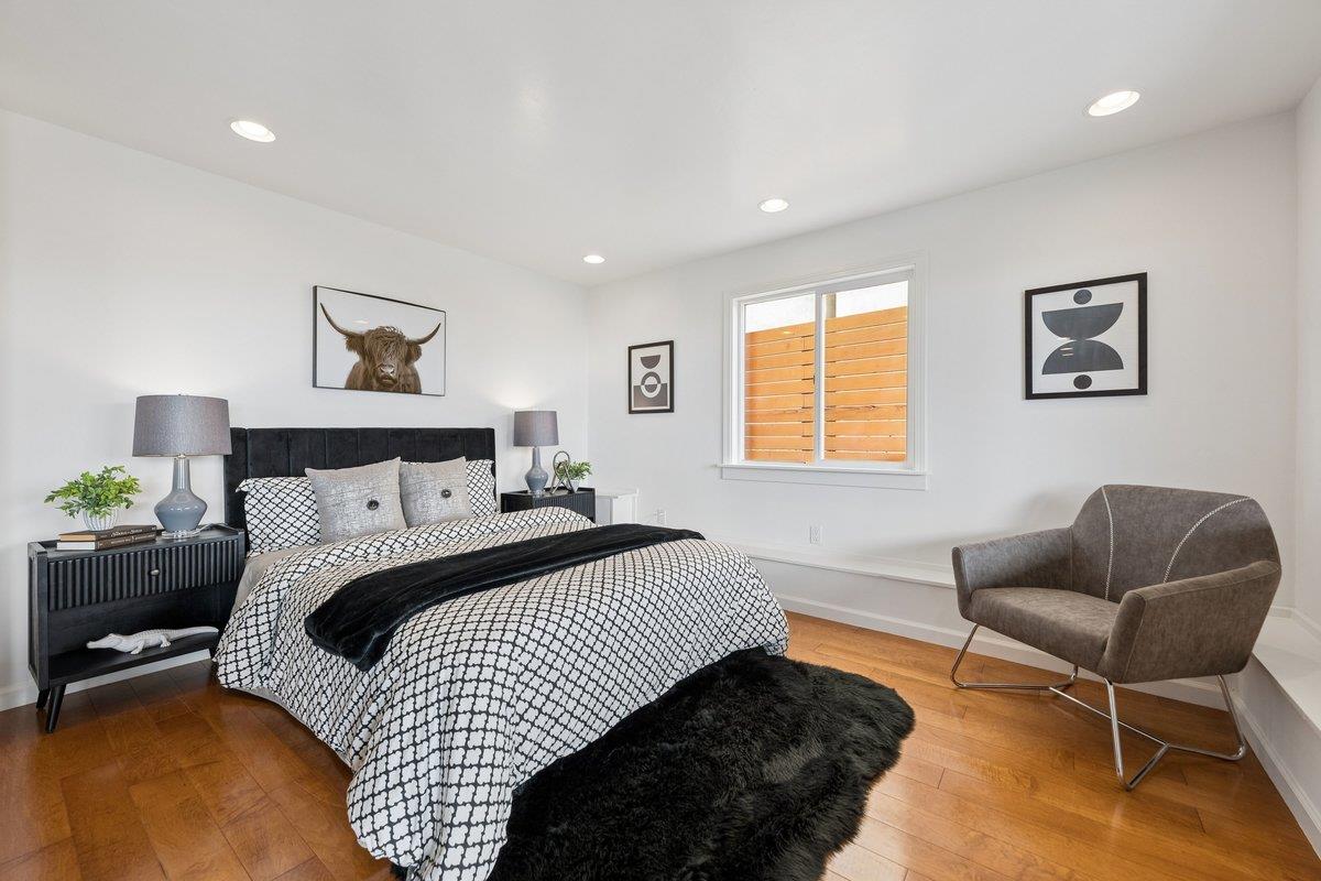 170 Beachview Avenue Pacifica, CA 94044 - Photo 65 of 85 a bedroom with a bed and a couch