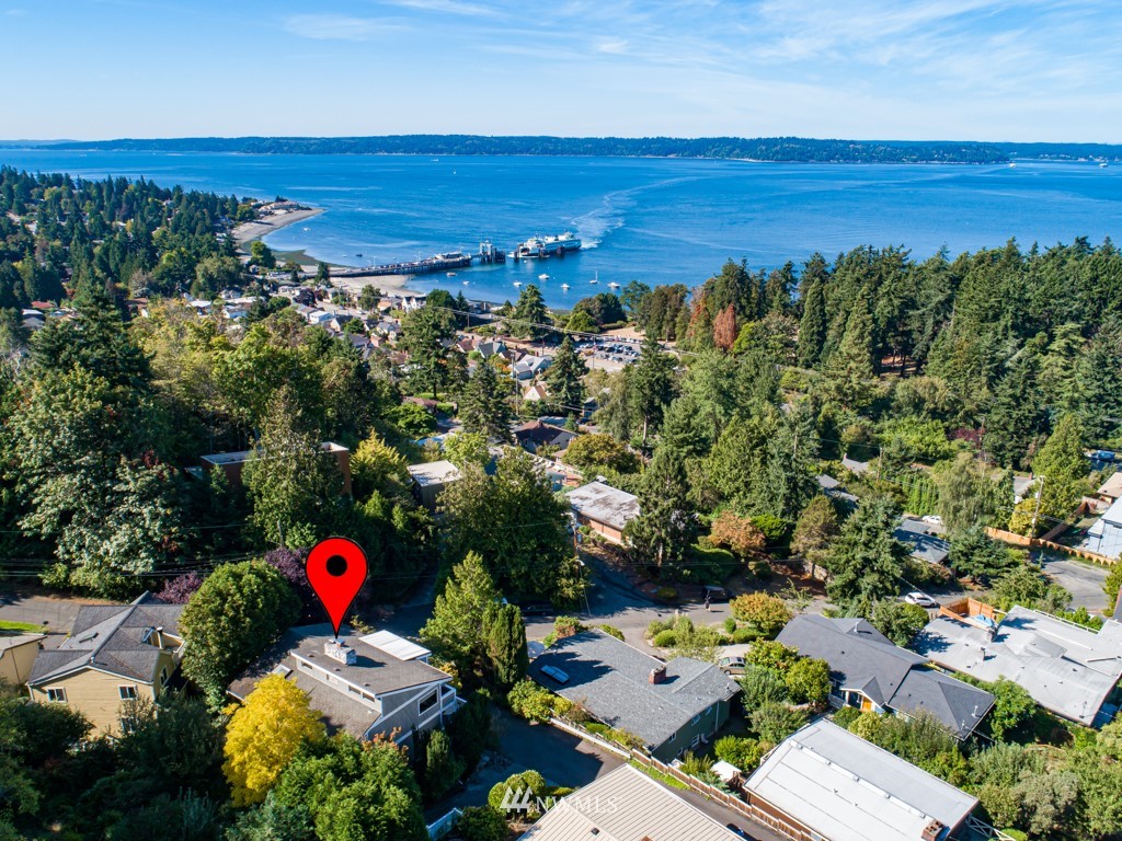 8438 Tillicum Road Southwest Seattle, WA 98136 - Photo 2 of 22 an aerial view of a houses with a garden