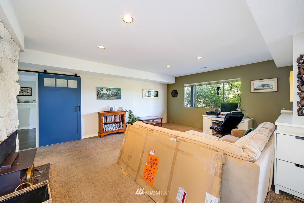 8438 Tillicum Road Southwest Seattle, WA 98136 - Photo 17 of 22 a view of a livingroom with furniture workspace and a window