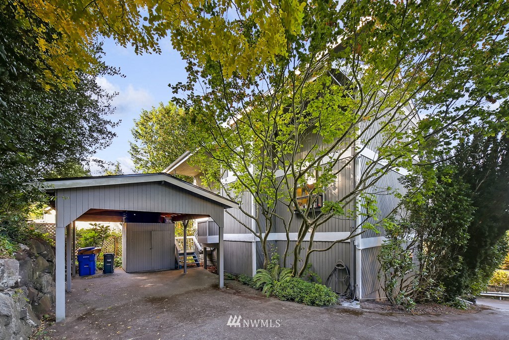 8438 Tillicum Road Southwest Seattle, WA 98136 - Photo 22 of 22 a view of a house with a entertaining space