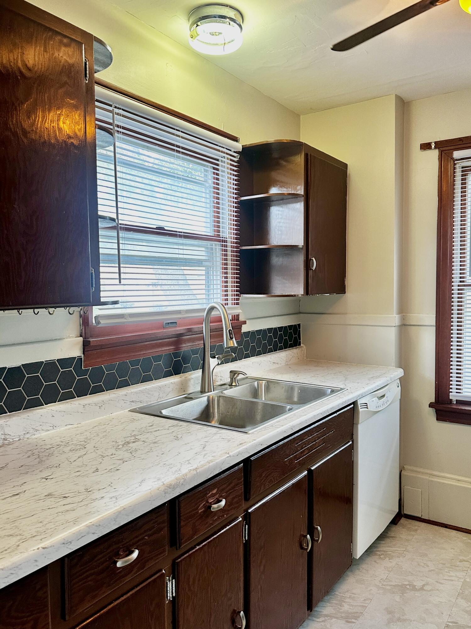 939 175th Place Hammond, IN 46324 - Photo 13 of 40 a kitchen with a sink and a window
