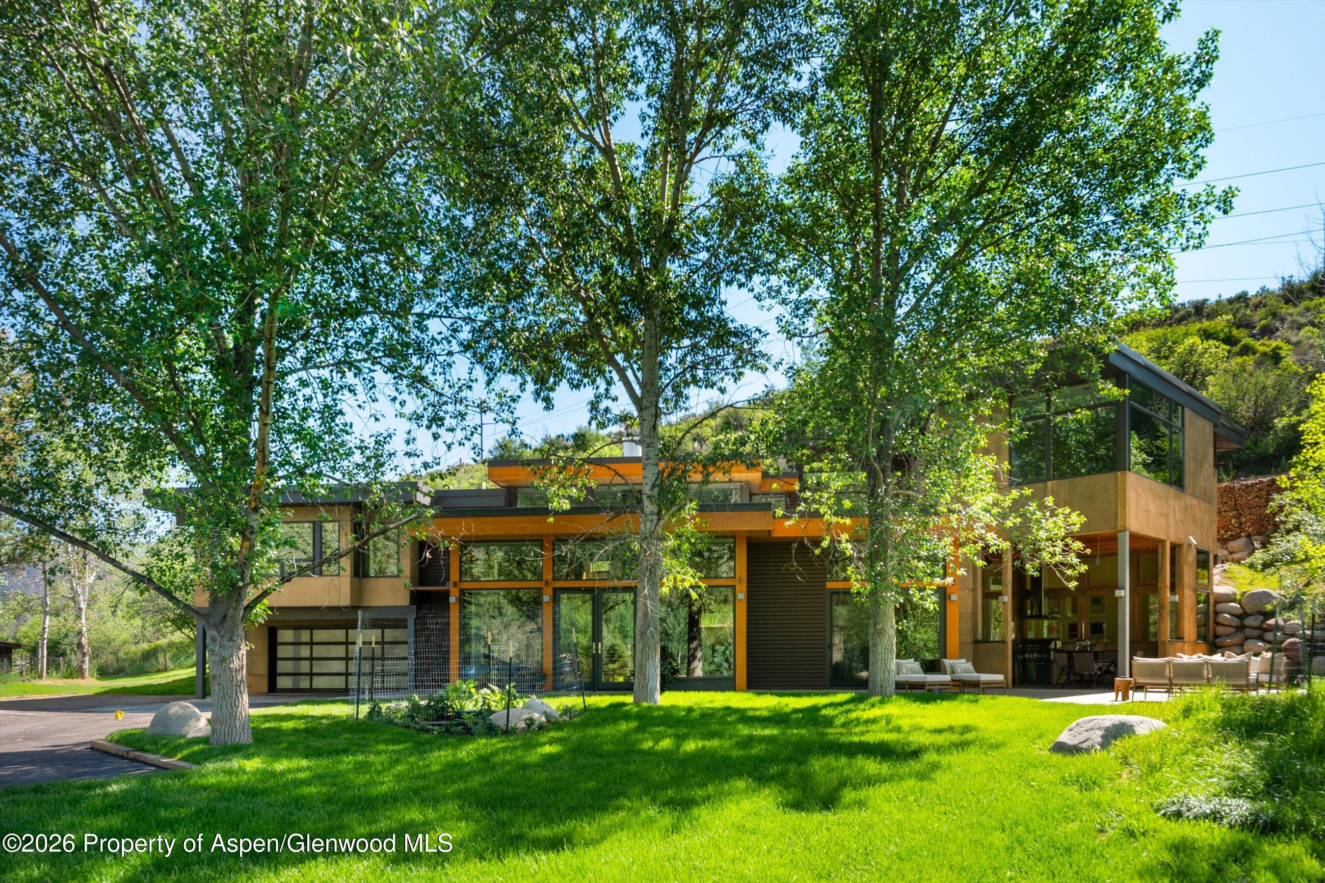 8389 Upper River Road Woody Creek, CO 81656 - Photo 1 of 31 Summer Exterior