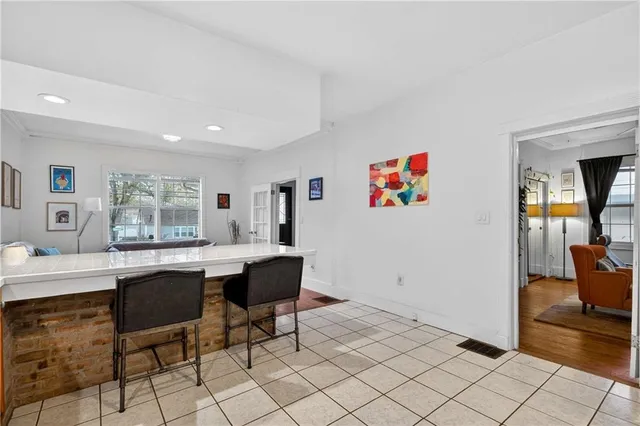 a view of a workspace with furniture