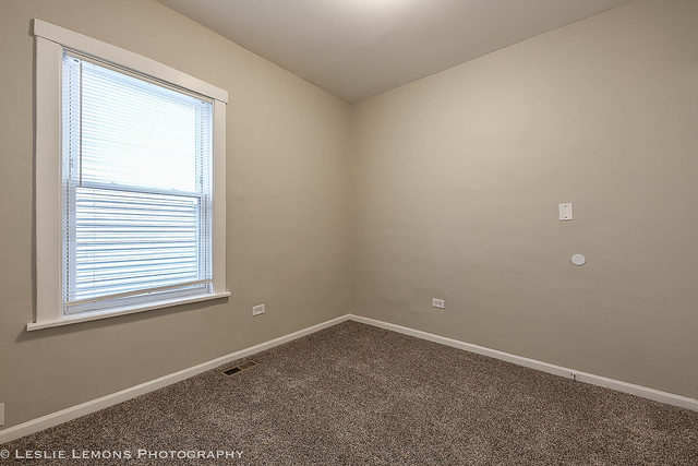 5331 West Addison Street Chicago, IL 60641 - Photo 16 of 32 a room that has a window in it