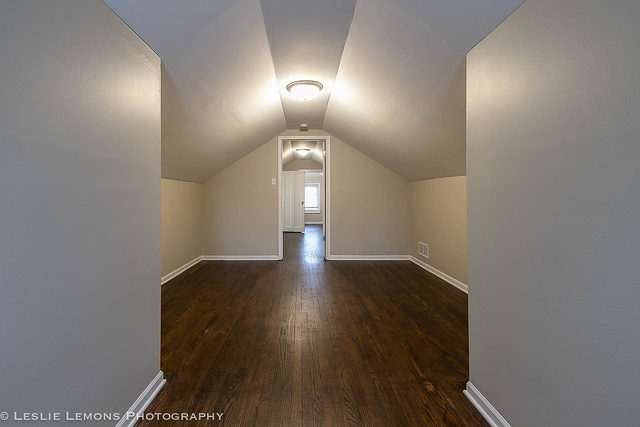 5331 West Addison Street Chicago, IL 60641 - Photo 19 of 32 an empty room with wooden floor and windows
