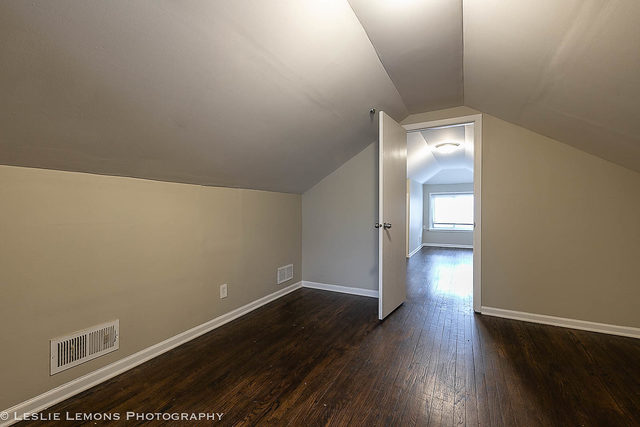 5331 West Addison Street Chicago, IL 60641 - Photo 21 of 32 a view of an empty room with wooden floor