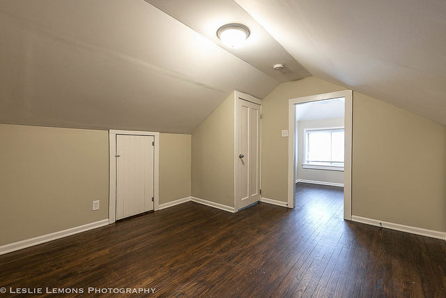 5331 West Addison Street Chicago, IL 60641 - Photo 22 of 32 an empty room with wooden floor and windows