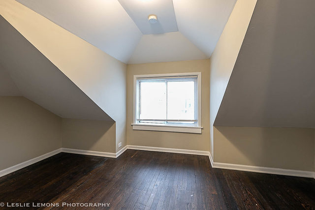 5331 West Addison Street Chicago, IL 60641 - Photo 23 of 32 a view of a livingroom with wooden floor and window