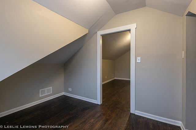 5331 West Addison Street Chicago, IL 60641 - Photo 24 of 32 a view of an empty room with wooden floor