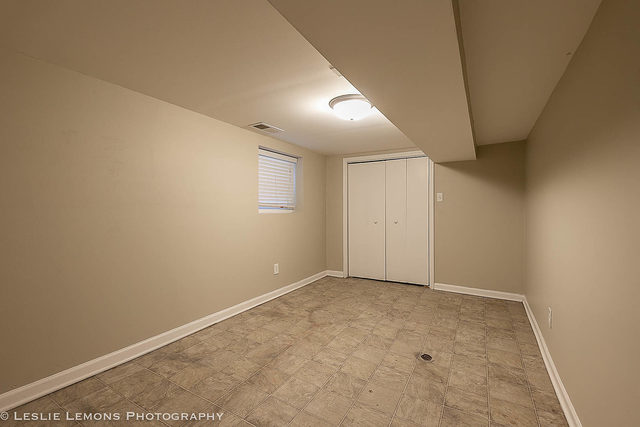 5331 West Addison Street Chicago, IL 60641 - Photo 28 of 32 wooden floor in an empty room