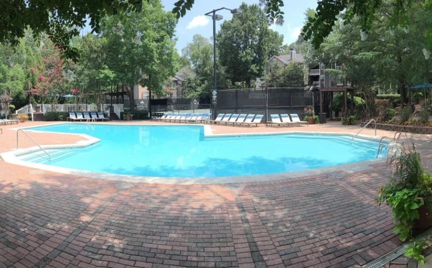 100 Akers Ridge Drive Southeast, Unit 1422 Atlanta, GA 30339 - Photo 12 of 15 a view of a swimming pool with a patio