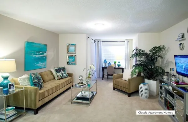 a living room with furniture and a couch