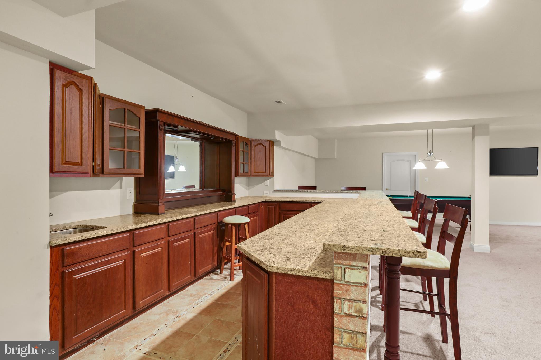 1601 Rushing Stream Court Forest Hill, MD 21050 - Photo 64 of 72 Wet bar w/ granite, built-in stemware rack