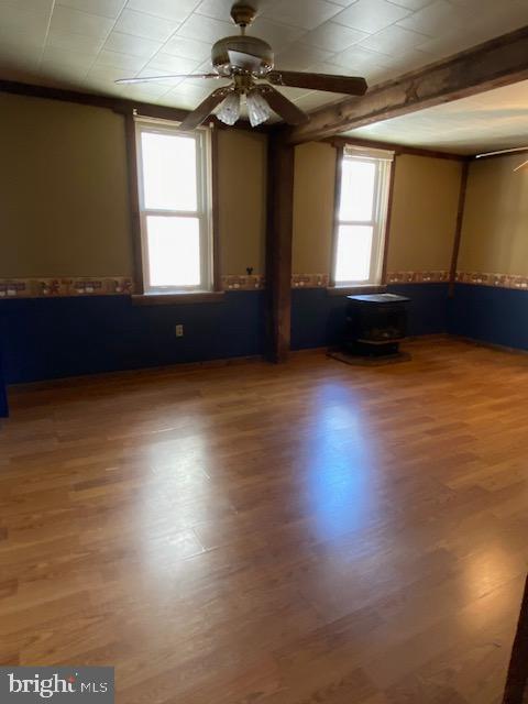 14074 2nd Street Mount Union, PA 17066 - Photo 14 of 35 a view of an empty room with a window and wooden floor