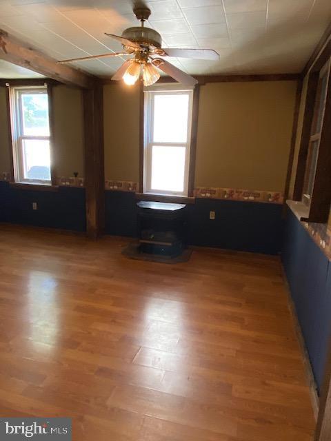 14074 2nd Street Mount Union, PA 17066 - Photo 15 of 35 an empty room with windows and fan