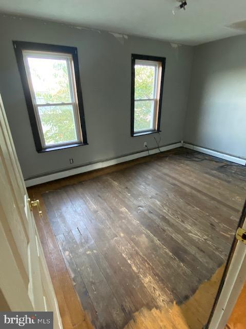 14074 2nd Street Mount Union, PA 17066 - Photo 20 of 31 an empty room with wooden floor and windows