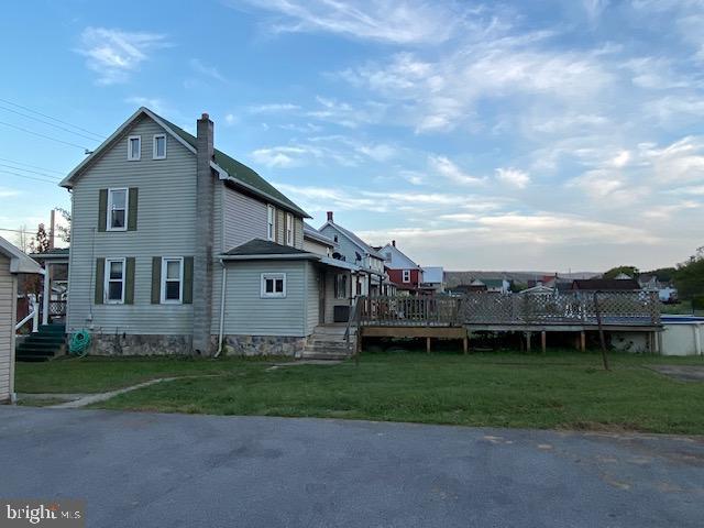 14074 2nd Street Mount Union, PA 17066 - Photo 5 of 31 a view of a house with a big yard and a large tree