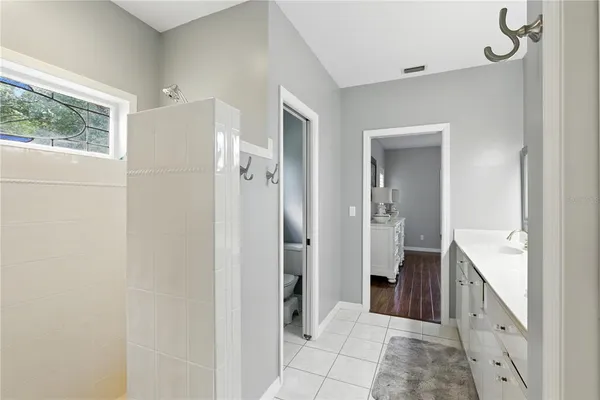 a kitchen with granite countertop a sink and a window