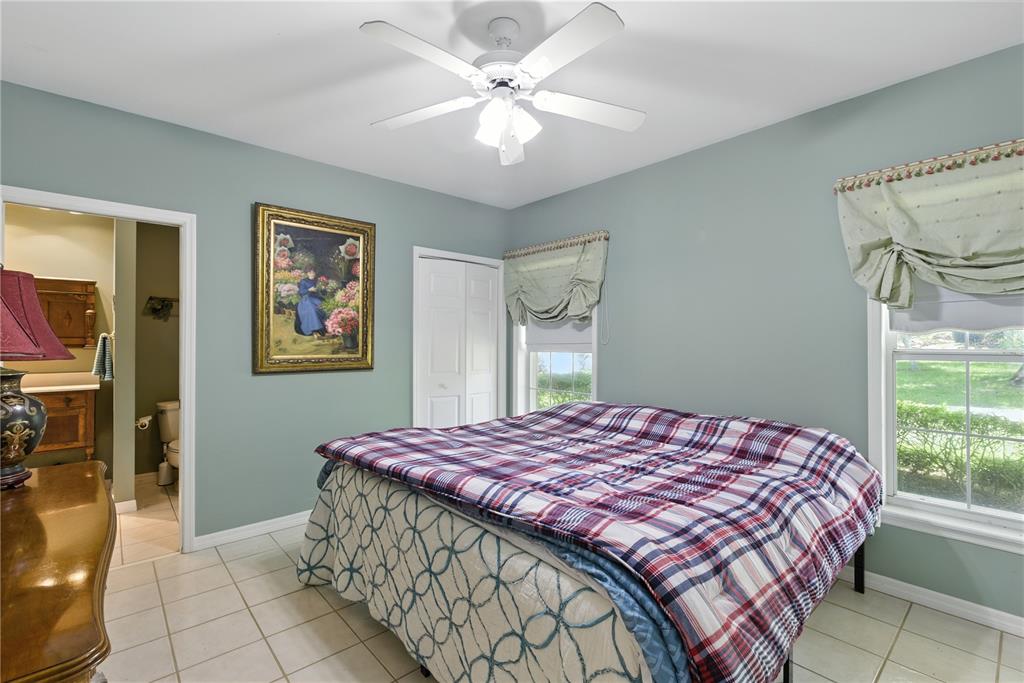 36641 Blanton Road Dade City, FL 33523 - Photo 33 of 76 a bedroom with a bed and a window