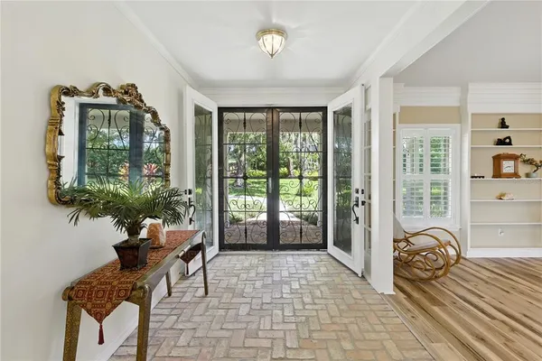 a view of an empty room with windows