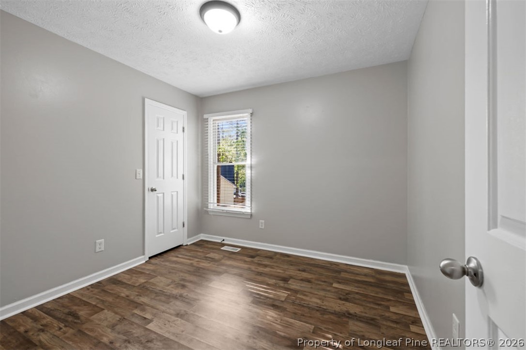 1205 Crossbend Court Fayetteville, NC 28314 - Photo 18 of 37 an empty room with a window