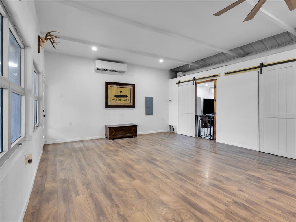 830 Louis Scherer Road Weatherford, TX 76088 - Photo 25 of 36 a view of empty room with wooden floor