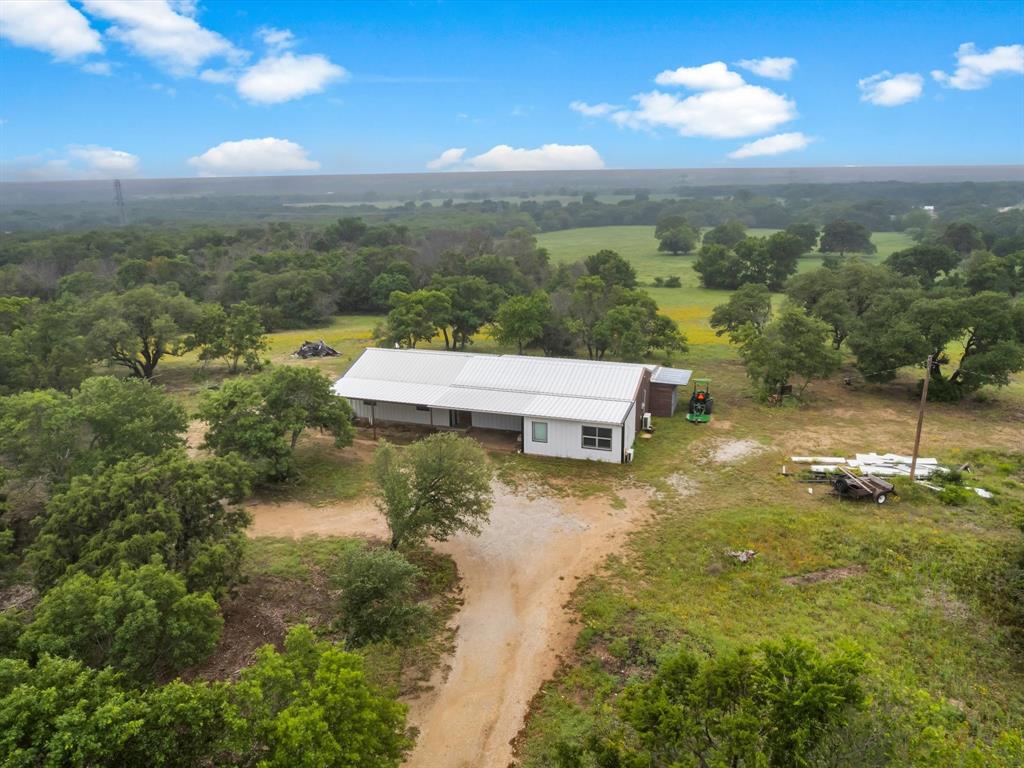 830 Louis Scherer Road Weatherford, TX 76088 - Photo 31 of 36 a view of a lake with a mountain in the background