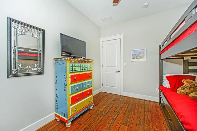 a room with furniture and flat screen tv