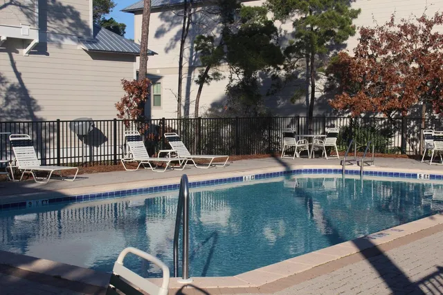 a view of a swimming pool with a patio