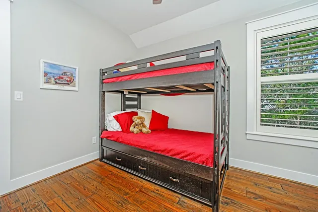 a room with bed and a window